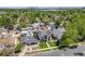 Desirable neighborhood featuring a modern home with green lawns and mature trees, with a glimpse of the Denver skyline at 2540 Jay St, Edgewater, CO 80214
