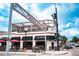 The exterior of Joyride Brewing featuring an outdoor seating area and charming architectural details at 2540 Jay St, Edgewater, CO 80214