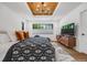 Spacious main bedroom showcasing modern finishes, recessed lighting, wood flooring and natural light from the windows at 2540 Jay St, Edgewater, CO 80214