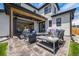 Charming outdoor living space with comfortable seating and a fire pit for relaxing and entertaining at 2540 Jay St, Edgewater, CO 80214