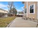 Backyard with patio, landscaping, and wooden fence at 13735 Steele Ct, Thornton, CO 80602