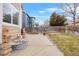 Large backyard patio with garden and privacy fence at 13735 Steele Ct, Thornton, CO 80602