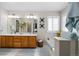 Elegant bathroom with double vanity and soaking tub at 13735 Steele Ct, Thornton, CO 80602