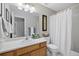 Clean bathroom with single sink vanity and shower/tub combo at 13735 Steele Ct, Thornton, CO 80602