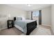 Well-lit bedroom with a comfortable bed and ample closet space at 13735 Steele Ct, Thornton, CO 80602