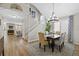 Bright dining area with a chandelier and access to the kitchen at 13735 Steele Ct, Thornton, CO 80602