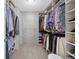 Spacious walk-in closet with ample shelving and hanging space at 13735 Steele Ct, Thornton, CO 80602