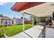 Backyard view of patio, lawn, and storage shed at 11349 Downing Dr, Northglenn, CO 80233