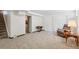 Spacious carpeted basement area with access to utilities, closets, and more space at 11349 Downing Dr, Northglenn, CO 80233
