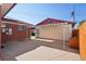 Detached garage with an awning and additional parking space, offering convenience and storage at 11349 Downing Dr, Northglenn, CO 80233