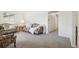 Cozy living room with floral furniture, neutral carpet, and ample natural light at 11349 Downing Dr, Northglenn, CO 80233