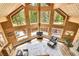 Spacious living room with vaulted wood ceilings and beautiful natural light at 387 Pine Dr, Idaho Springs, CO 80452