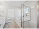 Bathroom featuring tub, shower, and double sinks at 660 Split Rock Dr, Erie, CO 80516