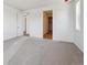 Spacious bedroom with walk-in closet and natural light at 9061 Telluride Ct, Commerce City, CO 80022