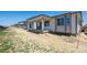 New construction home with covered patio at 9061 Telluride Ct, Commerce City, CO 80022