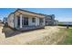 New construction home featuring a covered patio and spacious backyard at 9061 Telluride Ct, Commerce City, CO 80022