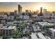 Breathtaking aerial view of the Denver skyline at sunset, showcasing the city's vibrant cityscape at 1729 N Clarkson St, Denver, CO 80218