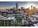 A panoramic view of Denver, Colorado, showcasing its stunning skyline against the backdrop of a beautiful sunset at 1729 N Clarkson St, Denver, CO 80218