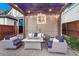 Cozy backyard patio with stylish seating and a fire pit, perfect for entertaining and relaxation at 1729 N Clarkson St, Denver, CO 80218