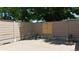 Fenced backyard with concrete patio, offering a private outdoor space at 467 Harrison St, Denver, CO 80206