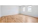 Spacious bedroom with hardwood floors and two windows at 467 Harrison St, Denver, CO 80206