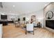 The expansive living room includes modern décor, stylish furnishings, and fireplace in an open layout at 467 Harrison St, Denver, CO 80206