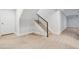 Staircase with black railing and access to multiple floors at 467 Harrison St, Denver, CO 80206