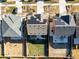 An aerial view shows solar panels on rooftops and well-maintained yards, showcasing community living at 5957 N Orleans St, Aurora, CO 80019