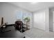 Home office featuring a large desk, chair, and built-in shelving at 5957 N Orleans St, Aurora, CO 80019