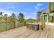 Enjoy beautiful scenery on this spacious back deck with wood flooring and scenic treetop views at 994 Timber Ln, Boulder, CO 80304