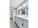 Stylish bathroom with double vanity, modern fixtures, and ample storage space for a spa-like experience at 994 Timber Ln, Boulder, CO 80304