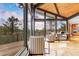 Cozy living space featuring wood ceilings, ample natural light, and beautiful outdoor views at 994 Timber Ln, Boulder, CO 80304