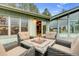 Outdoor patio featuring wicker seating around a fire pit, perfect for outdoor entertaining at 994 Timber Ln, Boulder, CO 80304