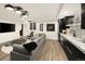 Finished basement with a stylish wet bar, comfortable seating, and modern decor at 418 Steele St, Denver, CO 80206