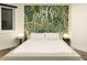 Modern bedroom features a unique accent wall and platform bed at 418 Steele St, Denver, CO 80206