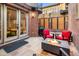Inviting brick patio with a cozy fire pit and comfortable seating at 418 Steele St, Denver, CO 80206