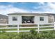 A cozy backyard with a patio set, fenced perimeter, and tidy lawn at 5072 Silver Hare Ln, Castle Rock, CO 80104