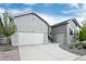 Beautiful house with a two-car garage, nice curb appeal and a well maintained driveway and front yard at 5072 Silver Hare Ln, Castle Rock, CO 80104
