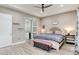 Beautiful primary bedroom with trey ceilings, lots of light and an ensuite bathroom at 5072 Silver Hare Ln, Castle Rock, CO 80104