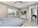 Bright primary bedroom with trey ceilings, nice windows and good access to other rooms at 5072 Silver Hare Ln, Castle Rock, CO 80104