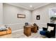 Comfortable home office with a wooden desk, elegant decor, and natural light, creating a productive space at 5072 Silver Hare Ln, Castle Rock, CO 80104