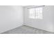 Simple bedroom with window and neutral decor at 11002 Glacier Park Cir, Parker, CO 80138