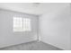 Bright and airy bedroom with a large window and neutral walls at 11002 Glacier Park Cir, Parker, CO 80138