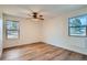 Bedroom with natural light, hardwood flooring, and windows at 4866 S Dudley St # 2, Littleton, CO 80123