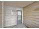 Exterior entrance to unit #2 featuring neutral siding and outdoor lighting at 4866 S Dudley St # 2, Littleton, CO 80123