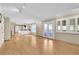 Large living room with access to the deck and an open floorplan to the kitchen at 5622 E Weaver Cir, Centennial, CO 80111