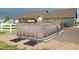 Above ground pool in a beautiful backyard, perfect for relaxation and summer fun at 55610 E 40Th Ave, Strasburg, CO 80136