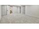 Finished basement featuring neutral paint, plush carpet, and doors to bathroom and additional rooms at 10508 W Chautauga Mtn, Littleton, CO 80127