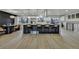 Modern kitchen features large island with bar seating and pendant lighting at 10508 W Chautauga Mtn, Littleton, CO 80127