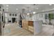 Bright kitchen features a large island and hardwood floors throughout at 10508 W Chautauga Mtn, Littleton, CO 80127